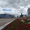 Vast carpets of flowers decorate many places in Astana. The blue building at the left side of the picture is the Palace of Independence.