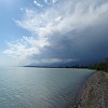 The thunderstorm clouds formed on the horizon about the north shore of Issyk-Kul lake.