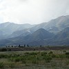 The Kungey Alatau of the Tian Shan runs parallel to the north shore. There is a beautiful trail going over this mountain range from the lake to Almaty in Kazakhstan. Unfortunately due to the forbidden border crossing the trail is closed since many years.