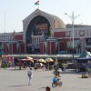 The very ornate pink and white building, a very confectionery style, is the Panjshanbe bazaar with stalls spilling over to the surrounding streets.