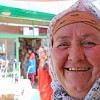 A bazaar saleswoman with golden teeth.