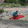 Waiting for the car wash to finish is a good opportunity to thanks Allah for surviving the dangerous crossing of the high Anzob Pass.