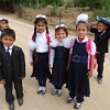 A group of school kids in the village Romit at first day of the new school year.