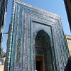 At the end of the pathway between the mausoleums, the complex opens up into Samarkand’s main cemetery from 9th century, which is still used today.