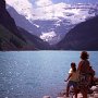 Tourists at the scenic Lake Louise.<br/>In the summer months the most popular destinations in the Rocky Mountains, like Lake Louise, are crowded with visitors. There is almost no public transportation in the mountains, the most north americans travel with big camping cars.