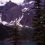 The blue-green Moraine Lake is one of the many glacially fed lakes in Rocky Mountains.<br/>The beautiful color of the water is due to the refraction of light off the rock flour deposited in the lake by glacier on a continual basis.